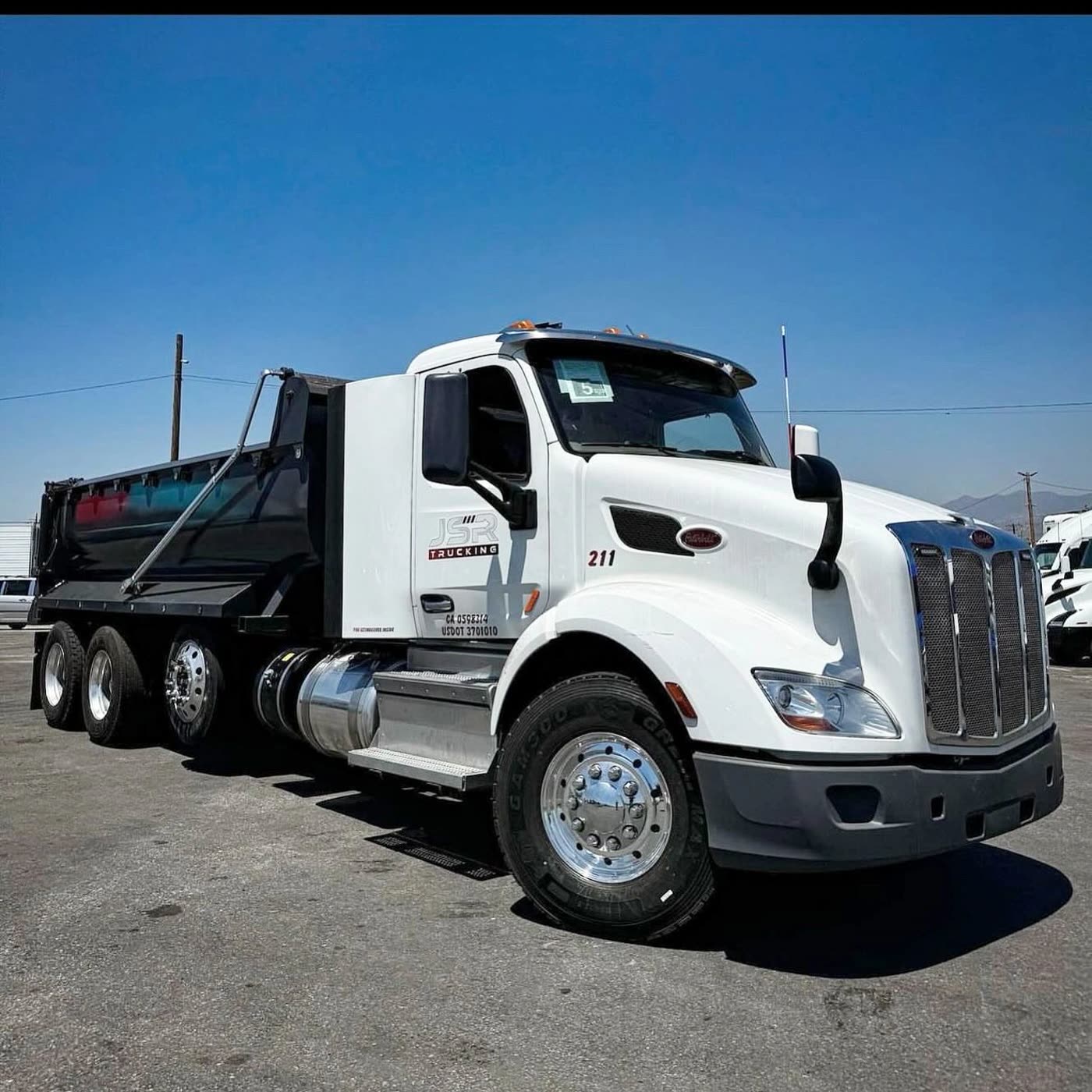 Dump body mounted to a Peterbilt chassis by DM Welding