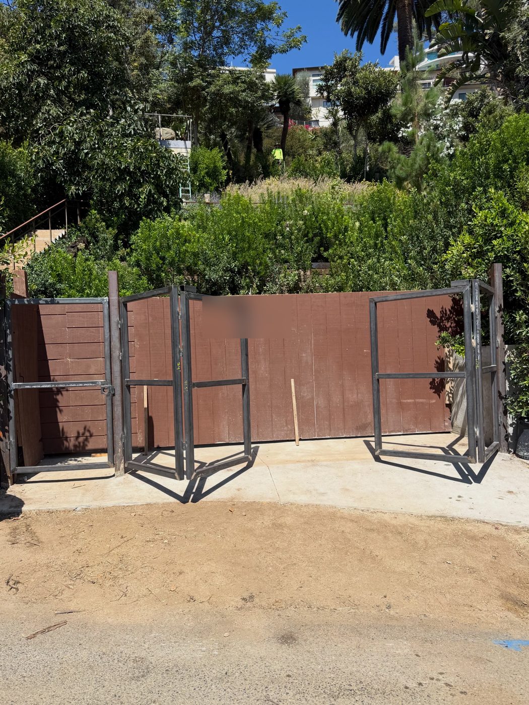 Steel framed double driveway gate built by DM Welding, both leaves swung open