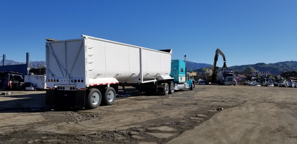 White transfer set parked in a yard